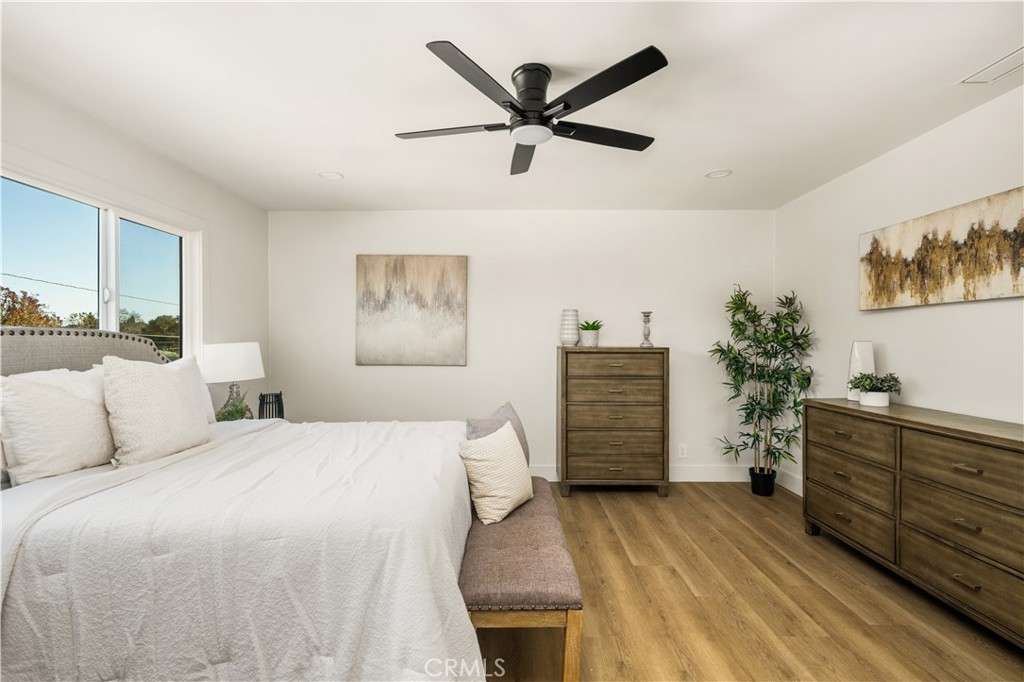 2440 Ostrom Avenue Long Beach, CA 90815 - Photo 44 of 50 a bedroom with a bed dresser and a window