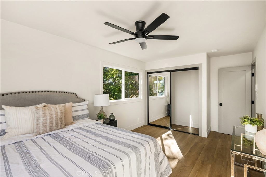 2440 Ostrom Avenue Long Beach, CA 90815 - Photo 50 of 50 a bedroom with a large bed and a large window