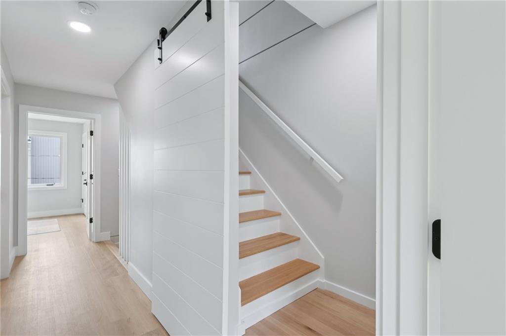 1211 Boyle Street Pittsburgh, PA 15212 - Photo 24 of 38 a view of a hallway with wooden floor and entryway