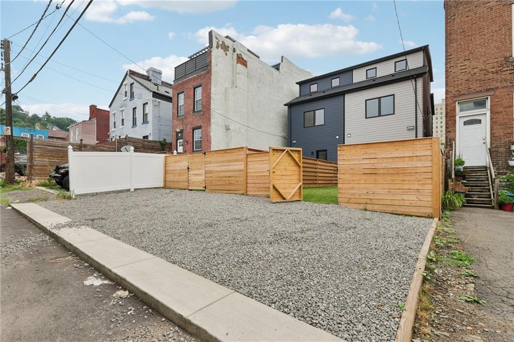 1211 Boyle Street Pittsburgh, PA 15212 - Photo 36 of 38 a view of a house with a backyard