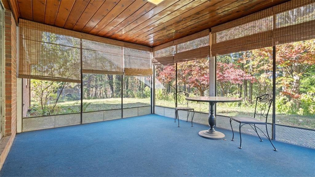 507 Rochester Road Rochester, PA 15074 - Photo 11 of 35 a view of an empty room with wooden floor and iron stairs