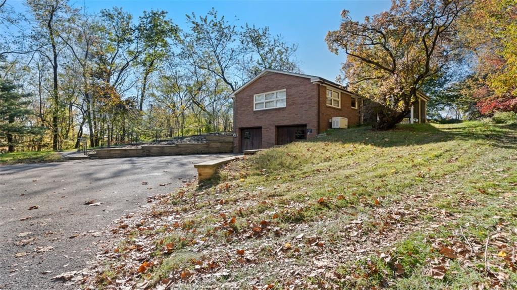 507 Rochester Road Rochester, PA 15074 - Photo 30 of 35 a front view of a house with a yard