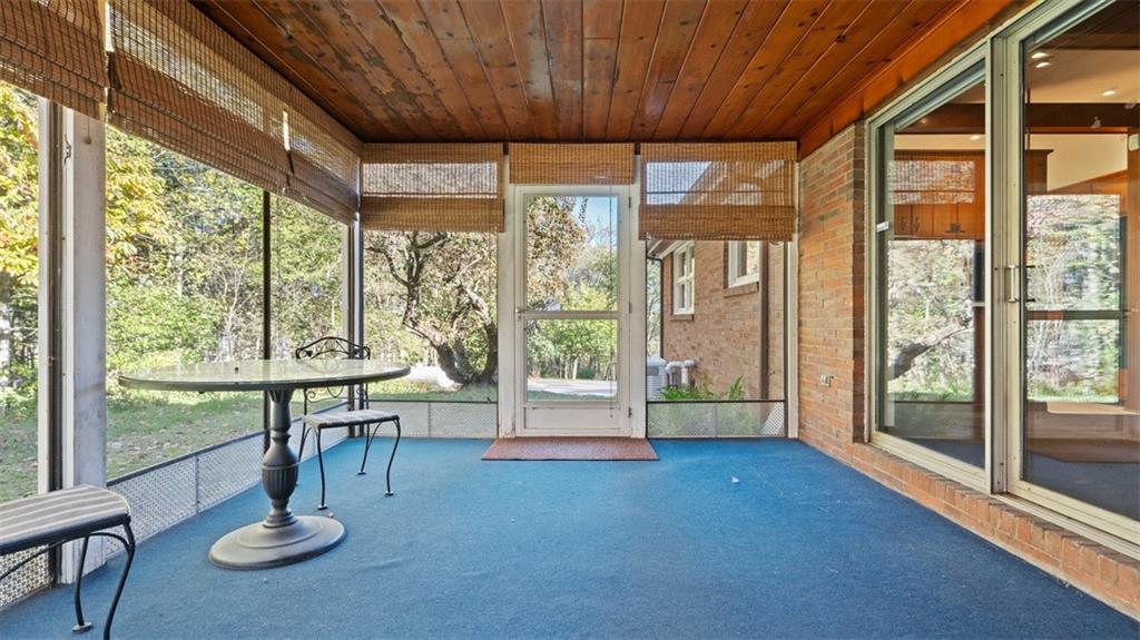 507 Rochester Road Rochester, PA 15074 - Photo 10 of 35 a room with furniture and a large window