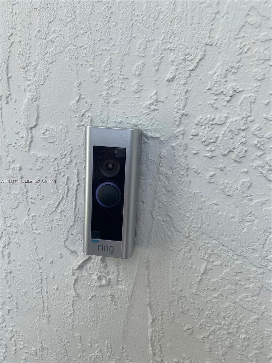 13281 Southwest 285th Street Homestead, FL 33033 - Photo 15 of 27 a brick building with a bench in it