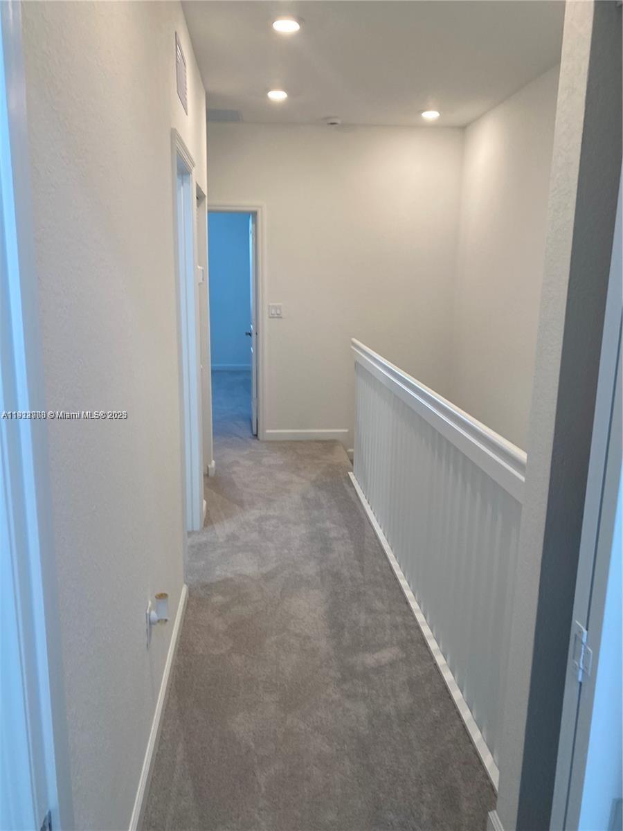 13281 Southwest 285th Street Homestead, FL 33033 - Photo 24 of 27 a view of hallway with stairs