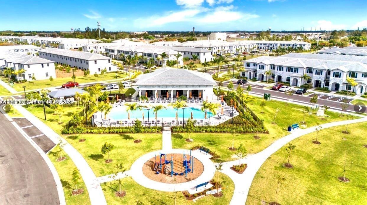 13281 Southwest 285th Street Homestead, FL 33033 - Photo 25 of 27 a view of a swimming pool with an outdoor space