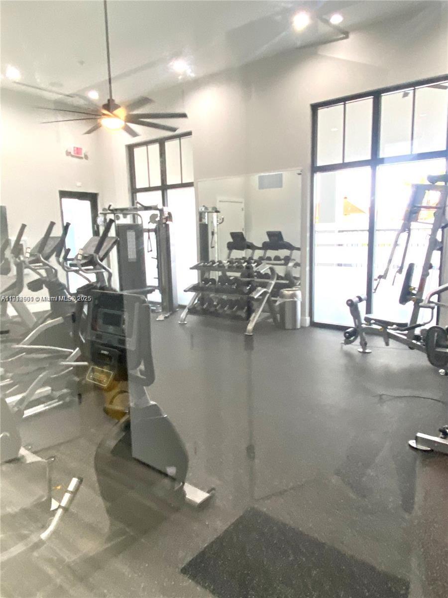 13281 Southwest 285th Street Homestead, FL 33033 - Photo 8 of 27 a view of a room with gym equipment
