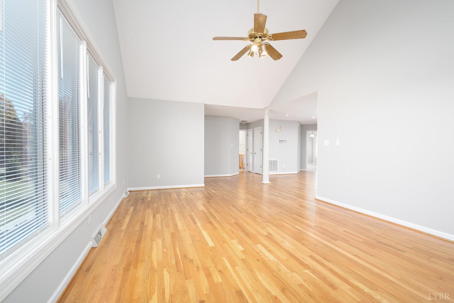 2629 Everett Road Forest, VA 24551 - Photo 13 of 47 a view of an empty room with wooden floor and a window