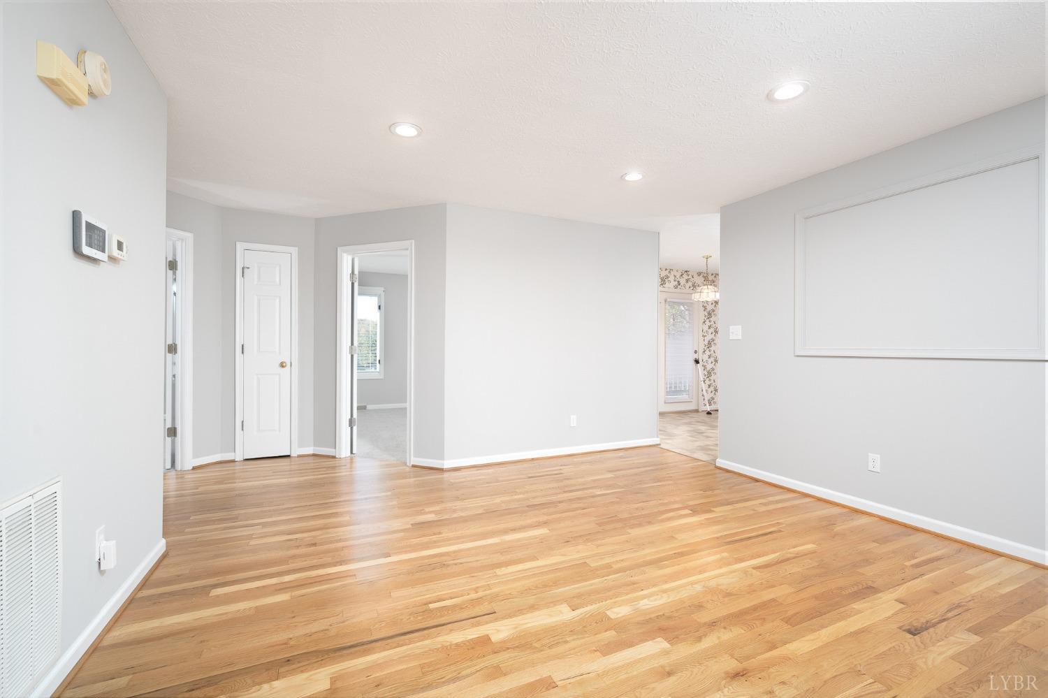 2629 Everett Road Forest, VA 24551 - Photo 14 of 47 a view of an empty room with wooden floor