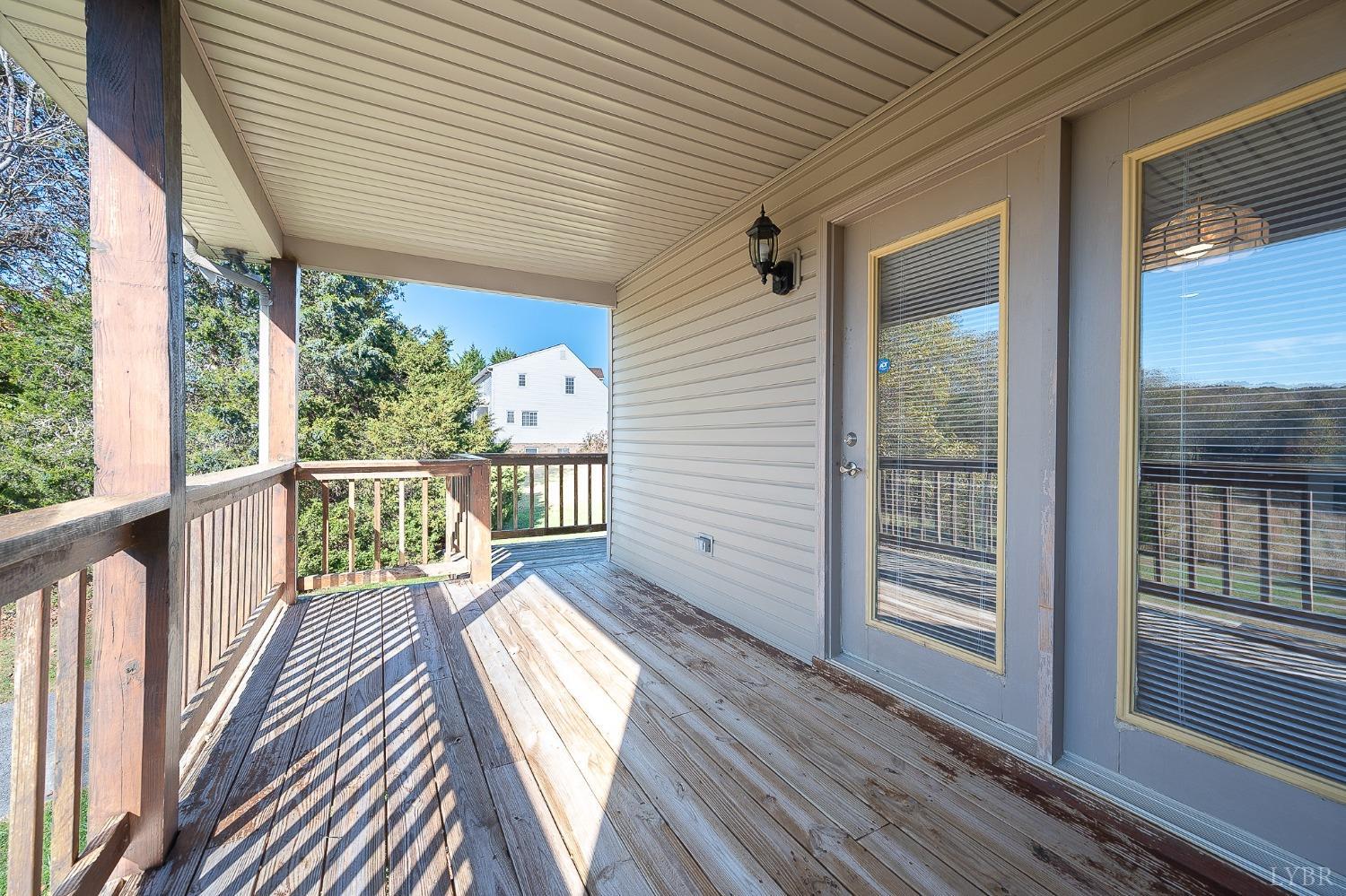 2629 Everett Road Forest, VA 24551 - Photo 21 of 47 a view of a balcony with wooden floor