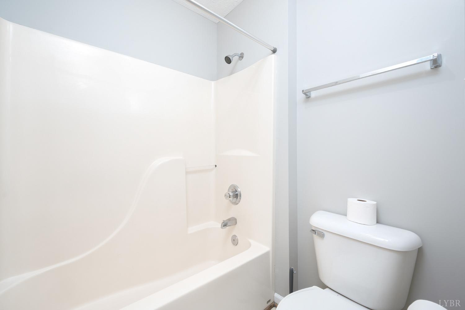 2629 Everett Road Forest, VA 24551 - Photo 35 of 47 a bathroom with a bathtub and a toilet