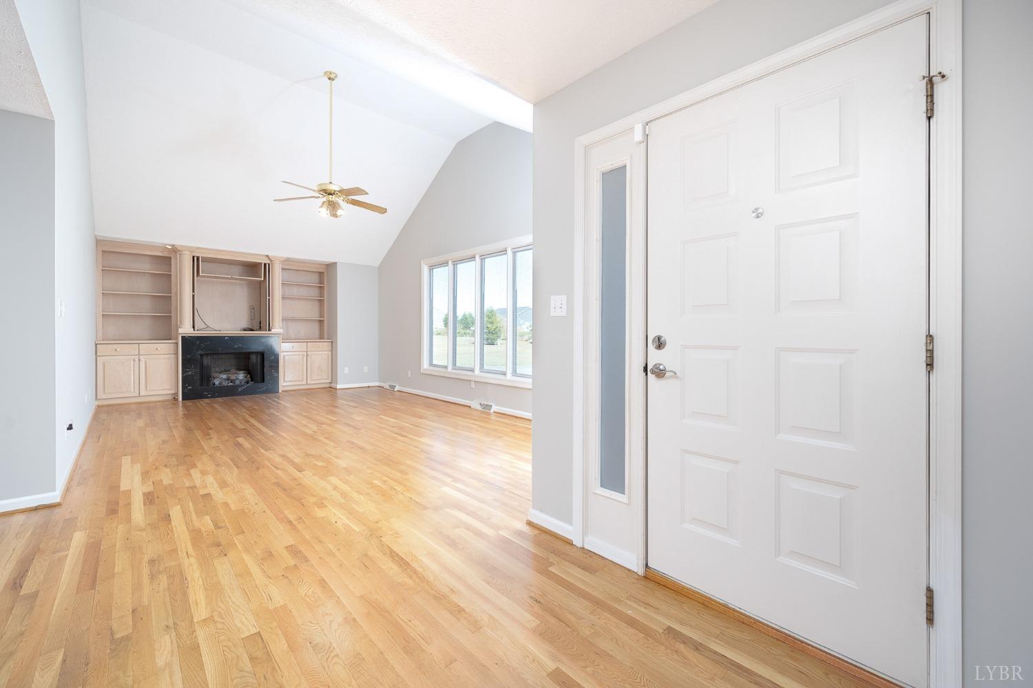 2629 Everett Road Forest, VA 24551 - Photo 9 of 47 a view of empty room with wooden floor and window