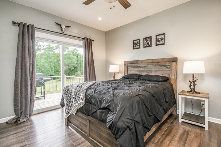 330 Billings Road Sparta, TN 38583 - Photo 14 of 28 a bedroom with a bed and a large window