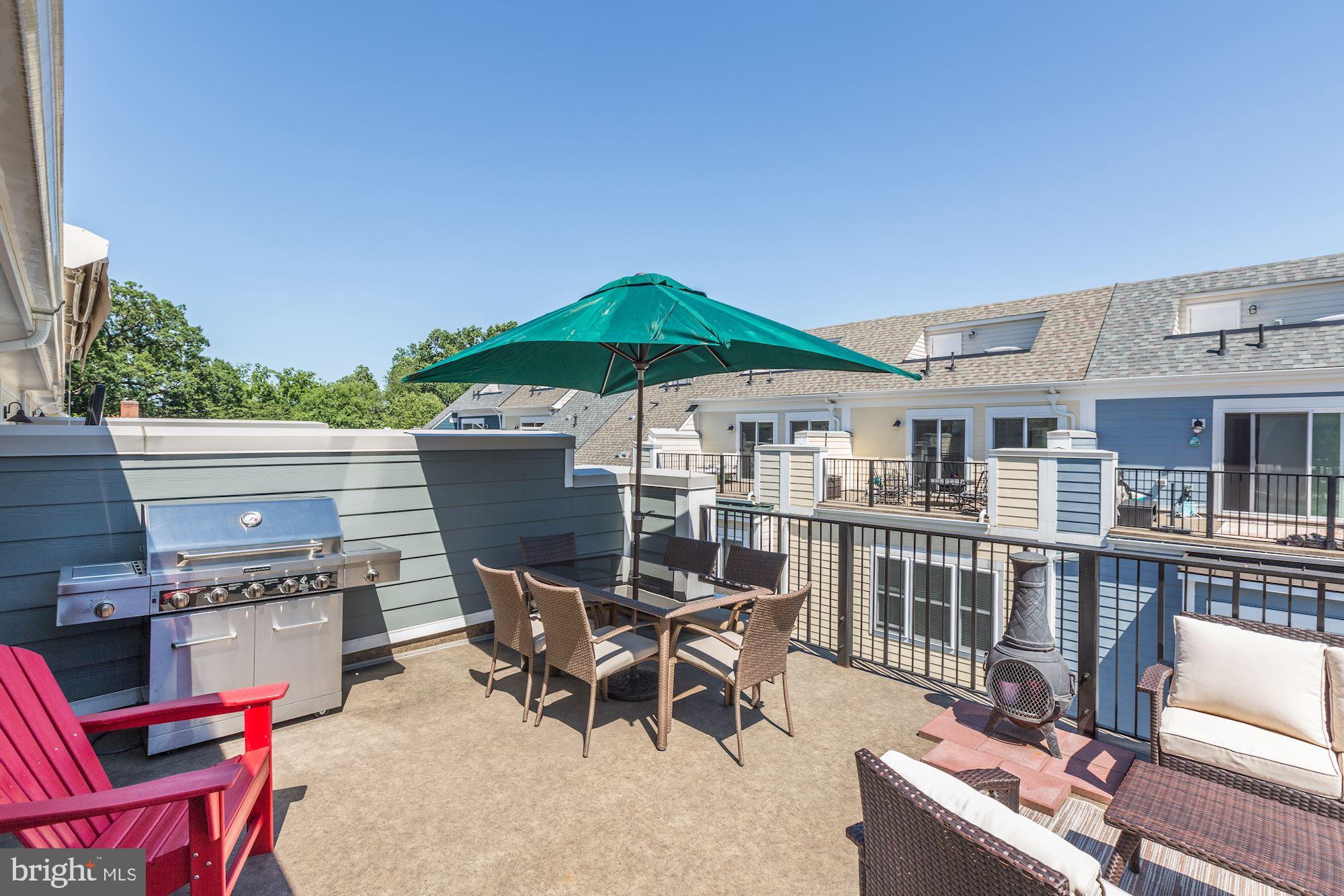 648 Ellsworth Drive Silver Spring, MD 20910 - Photo 32 of 33 Gas Grill and separate seating area