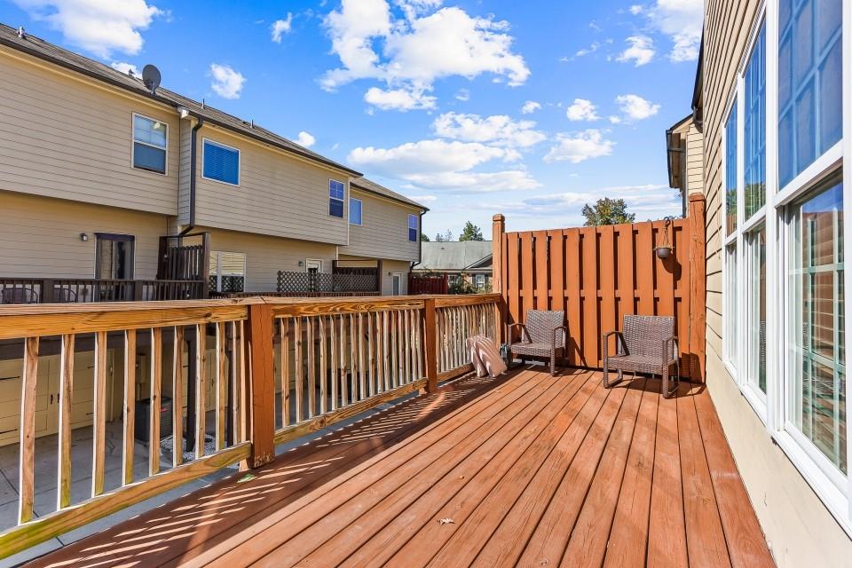 1946 Appaloosa Mill Circle Northeast Buford, GA 30519 - Photo 19 of 20 a view of balcony with wooden floor