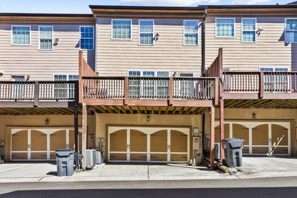 1946 Appaloosa Mill Circle Northeast Buford, GA 30519 - Photo 20 of 20 a front view of a house with a balcony