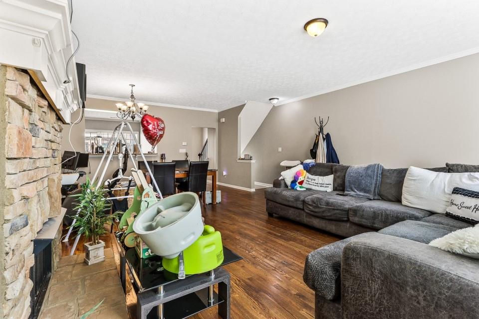 1946 Appaloosa Mill Circle Northeast Buford, GA 30519 - Photo 9 of 20 a living room with furniture and a couch