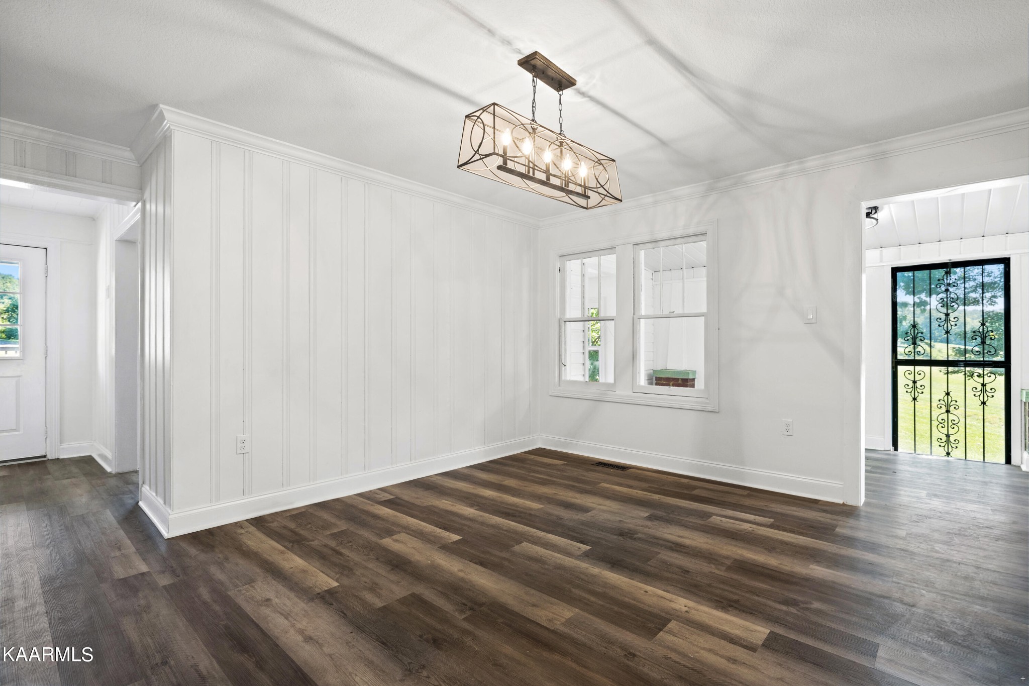 3044 Sims Road Sevierville, TN 37876 - Photo 11 of 34 a view of an empty room with wooden floor and a window