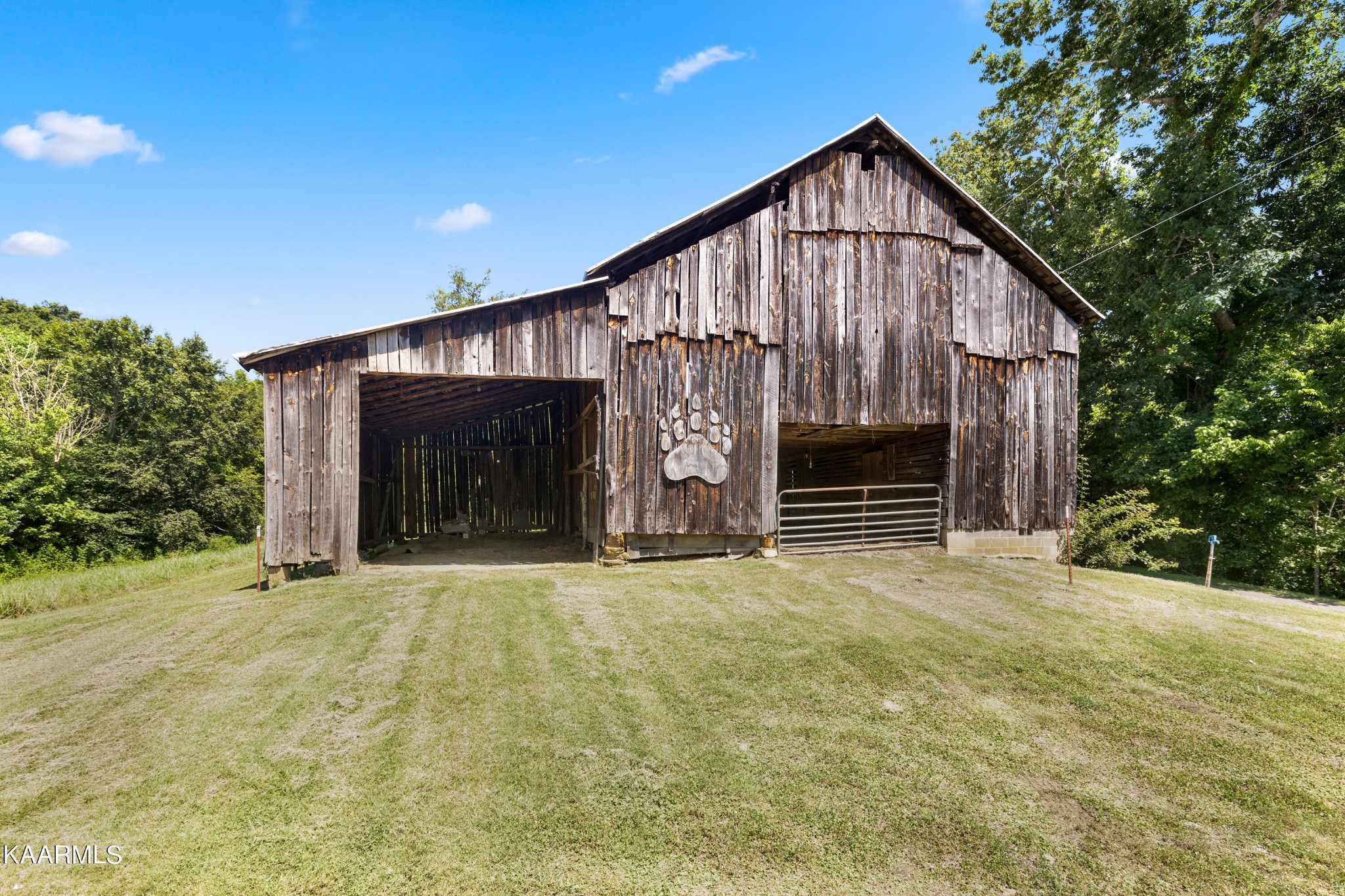 3044 Sims Road Sevierville, TN 37876 - Photo 31 of 34 a view of house with yard and garage