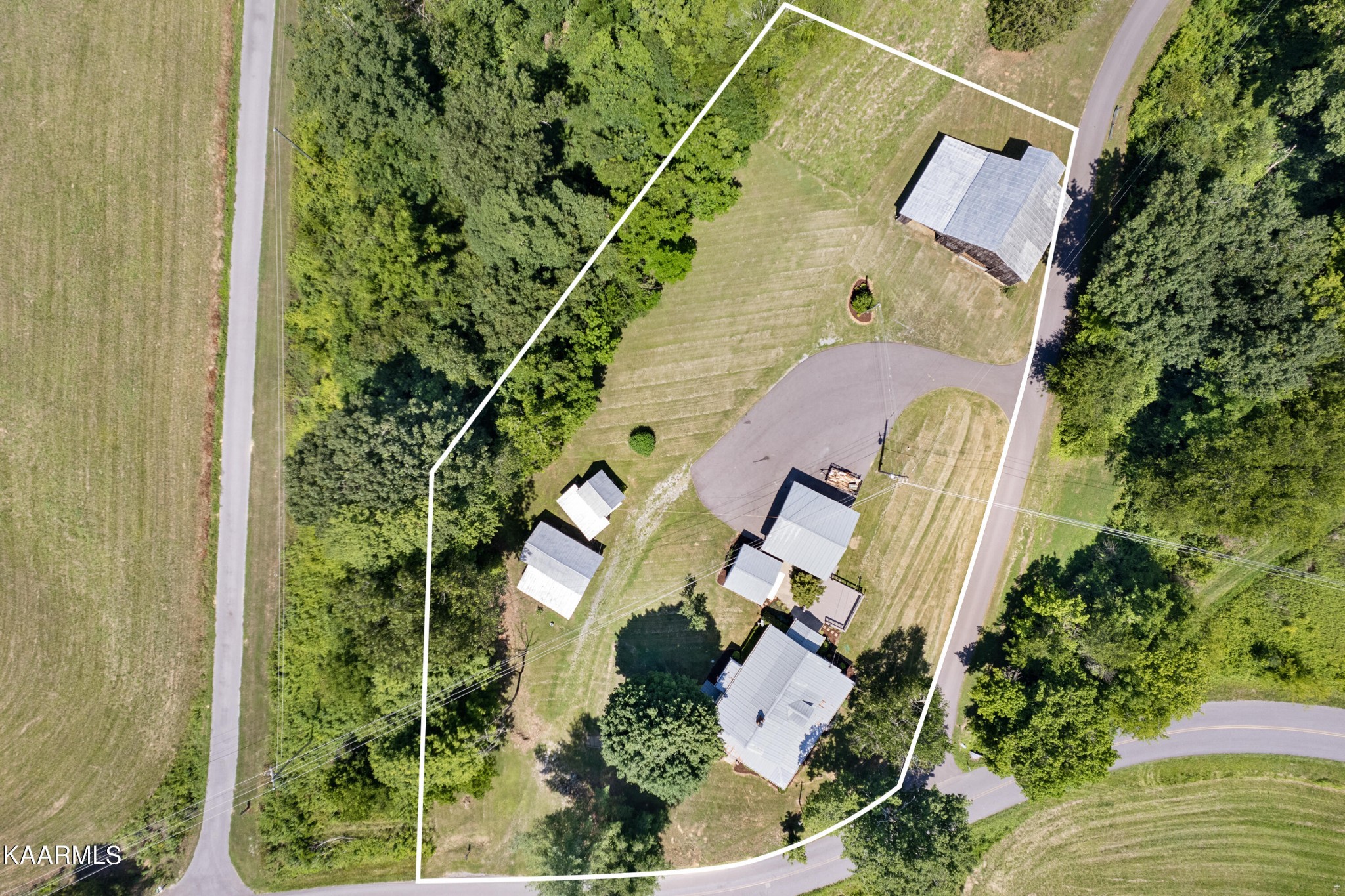 3044 Sims Road Sevierville, TN 37876 - Photo 34 of 34 an aerial view of a house with a yard and plants
