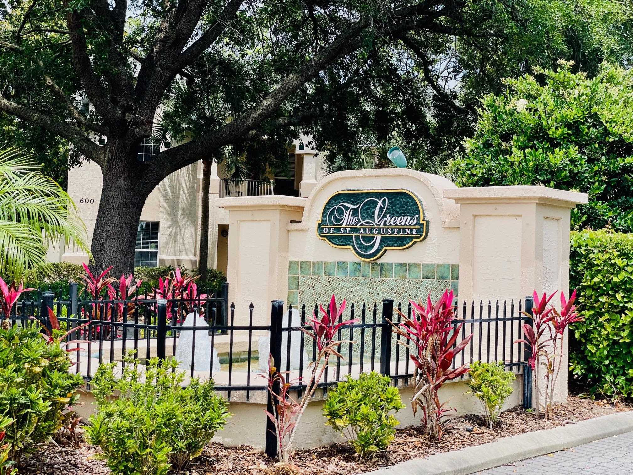 705 Augusta Circle St. Augustine, FL 32086 - Photo 2 of 52 a view of sign board with flower pots
