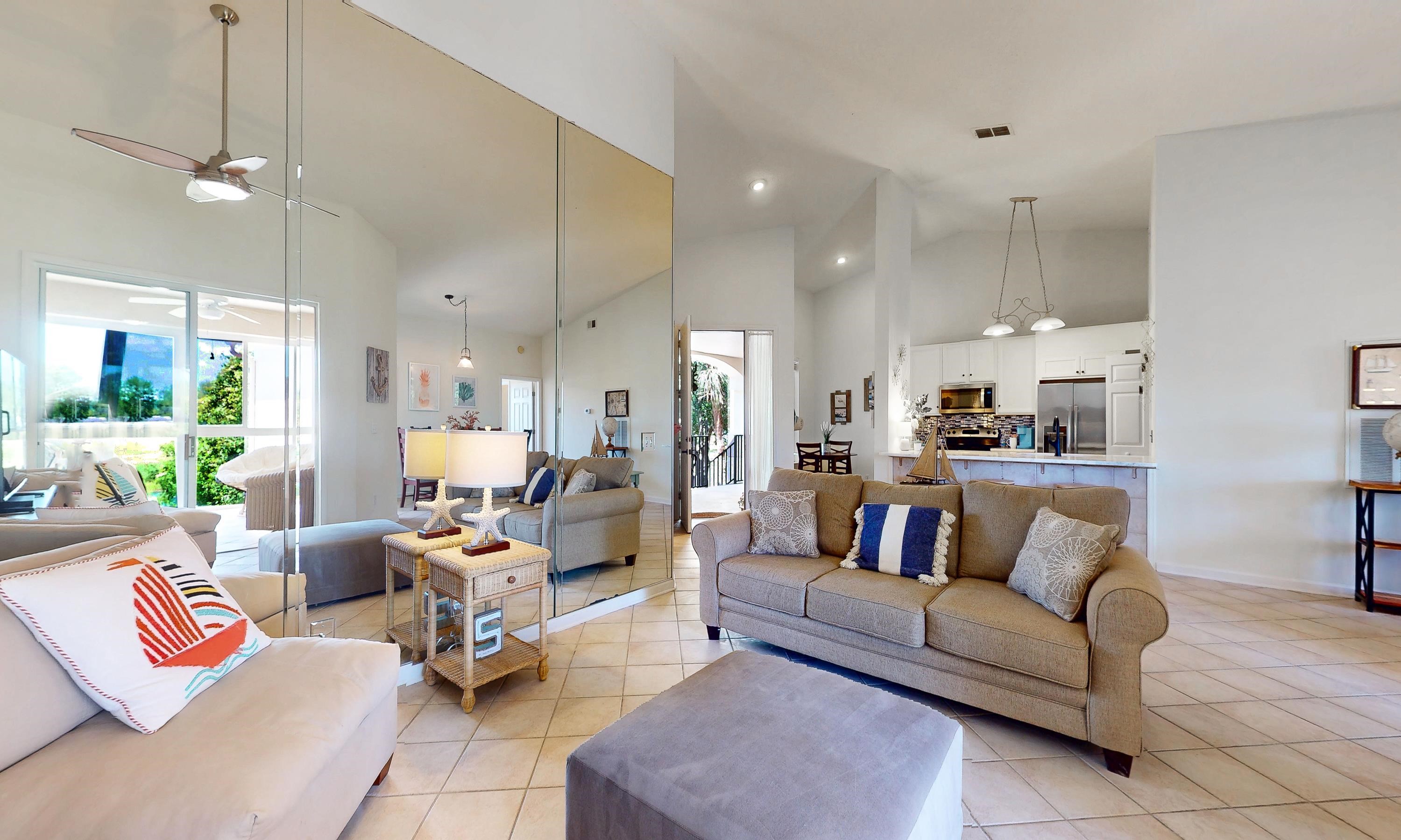 705 Augusta Circle St. Augustine, FL 32086 - Photo 4 of 52 a living room with furniture and a large window