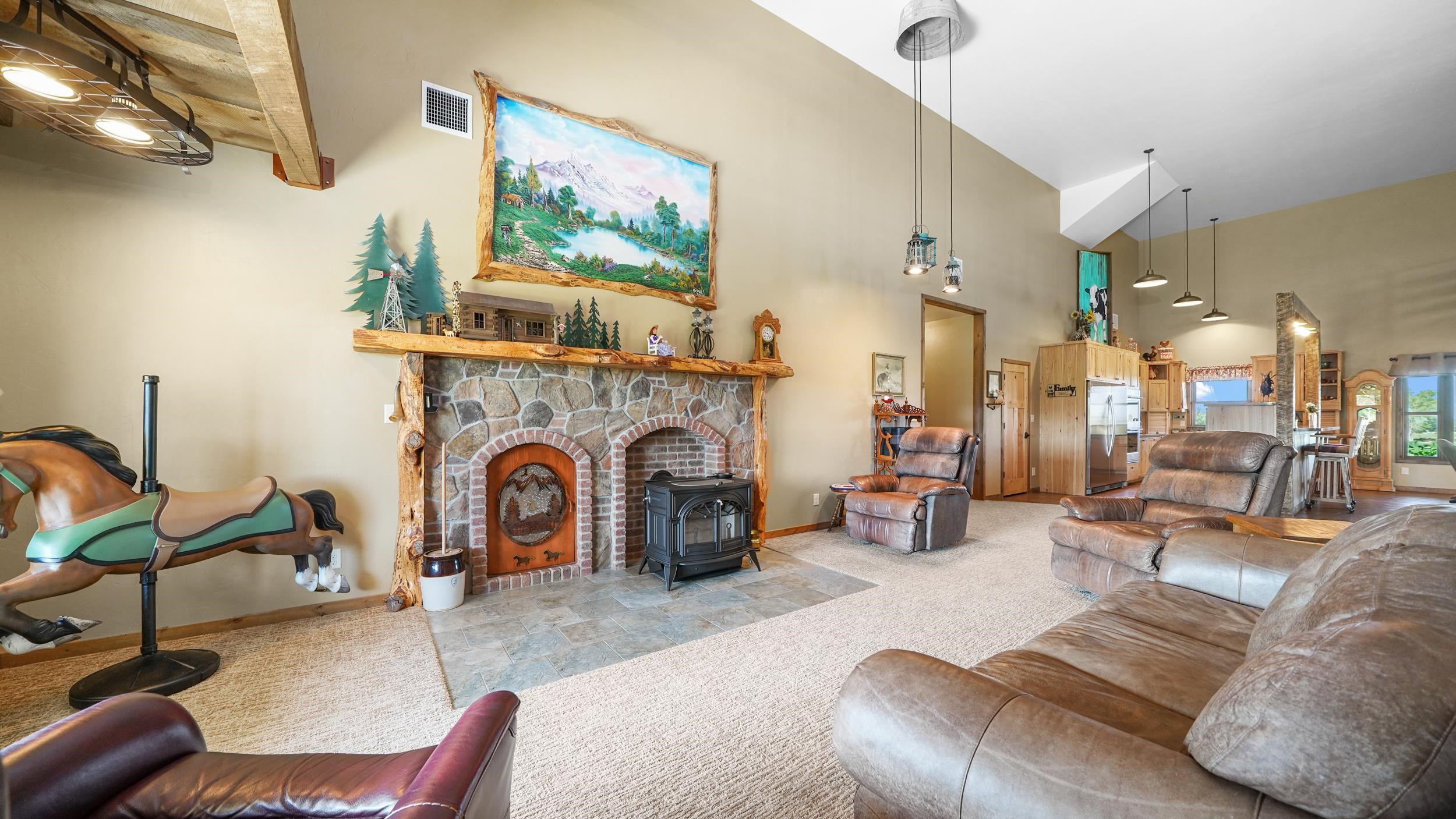 1029 25 Road Grand Junction, CO 81505 - Photo 11 of 41 a living room with furniture and a fireplace