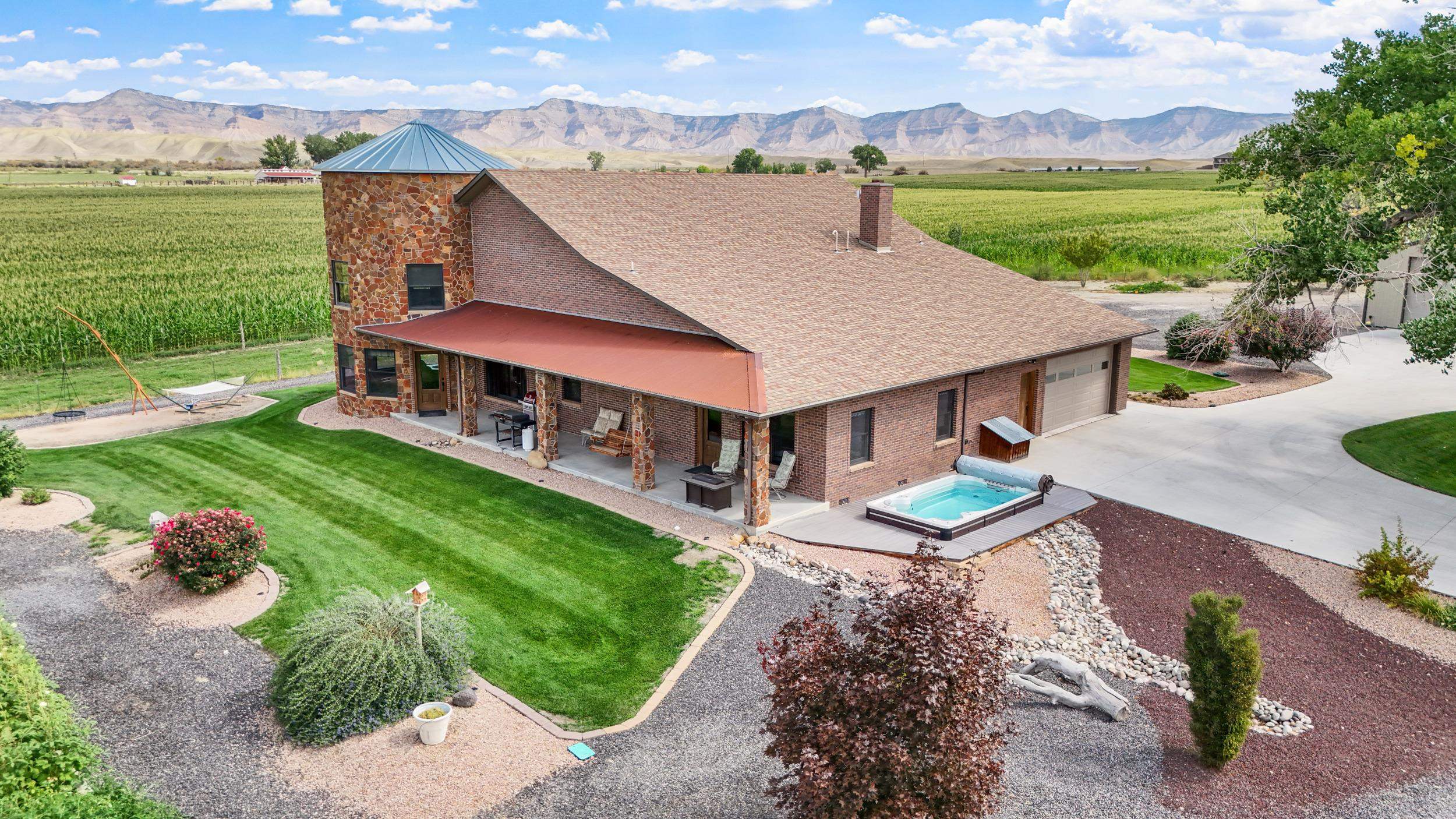 1029 25 Road Grand Junction, CO 81505 - Photo 2 of 42 an aerial view of a house with a yard