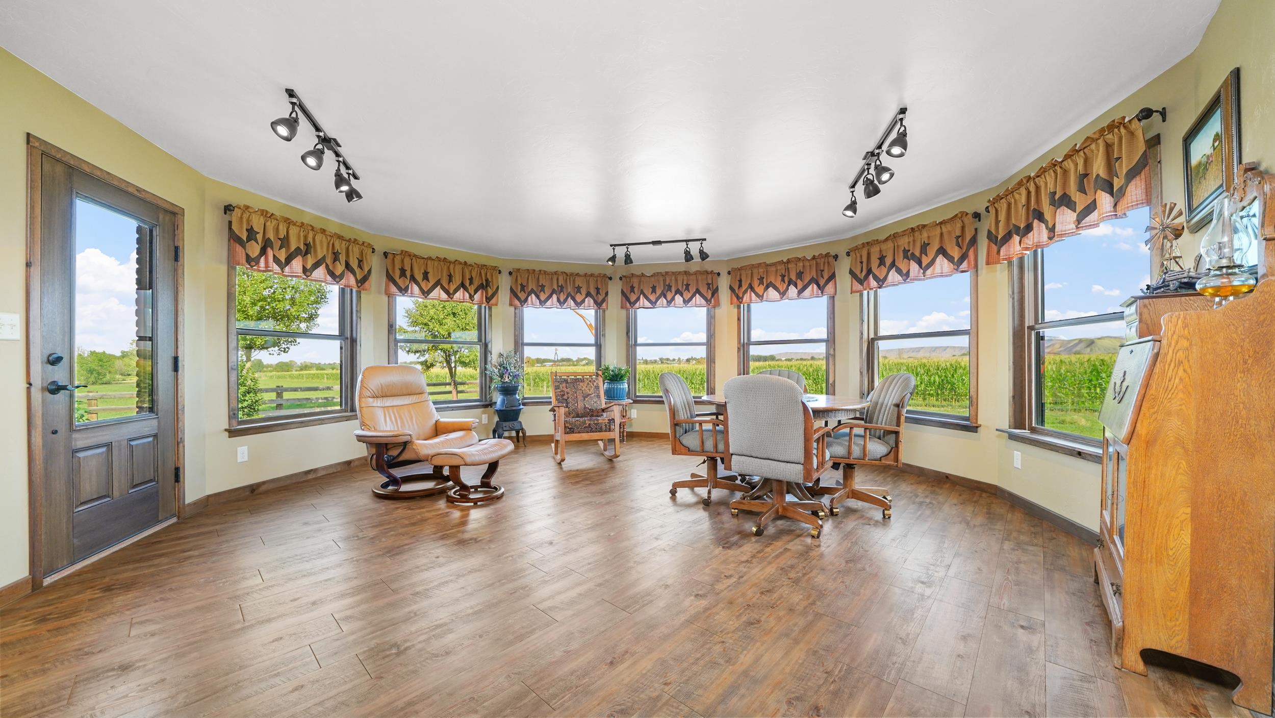 1029 25 Road Grand Junction, CO 81505 - Photo 22 of 42 a living room with furniture and a large window
