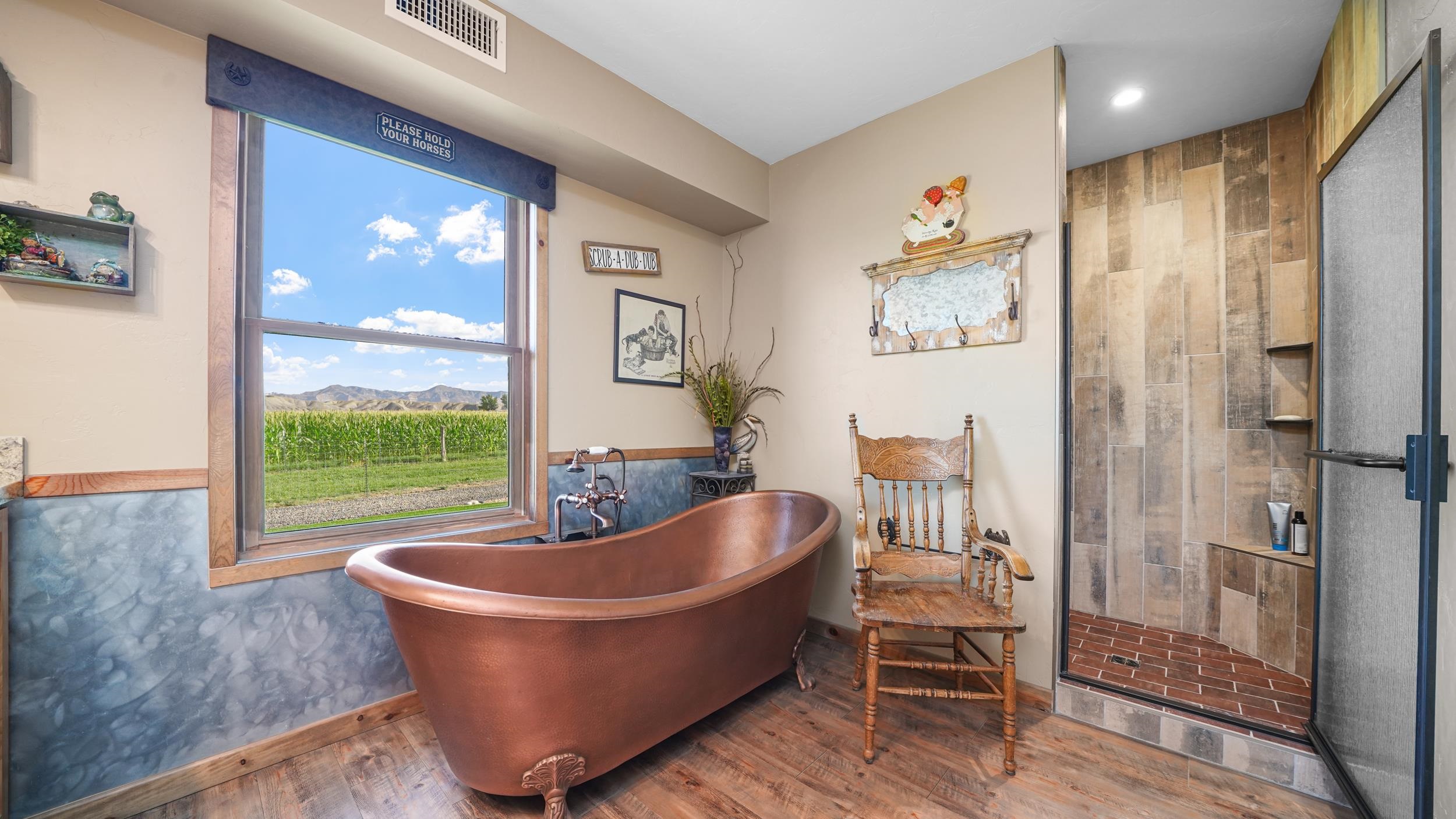 1029 25 Road Grand Junction, CO 81505 - Photo 30 of 42 a living room with large window and a table