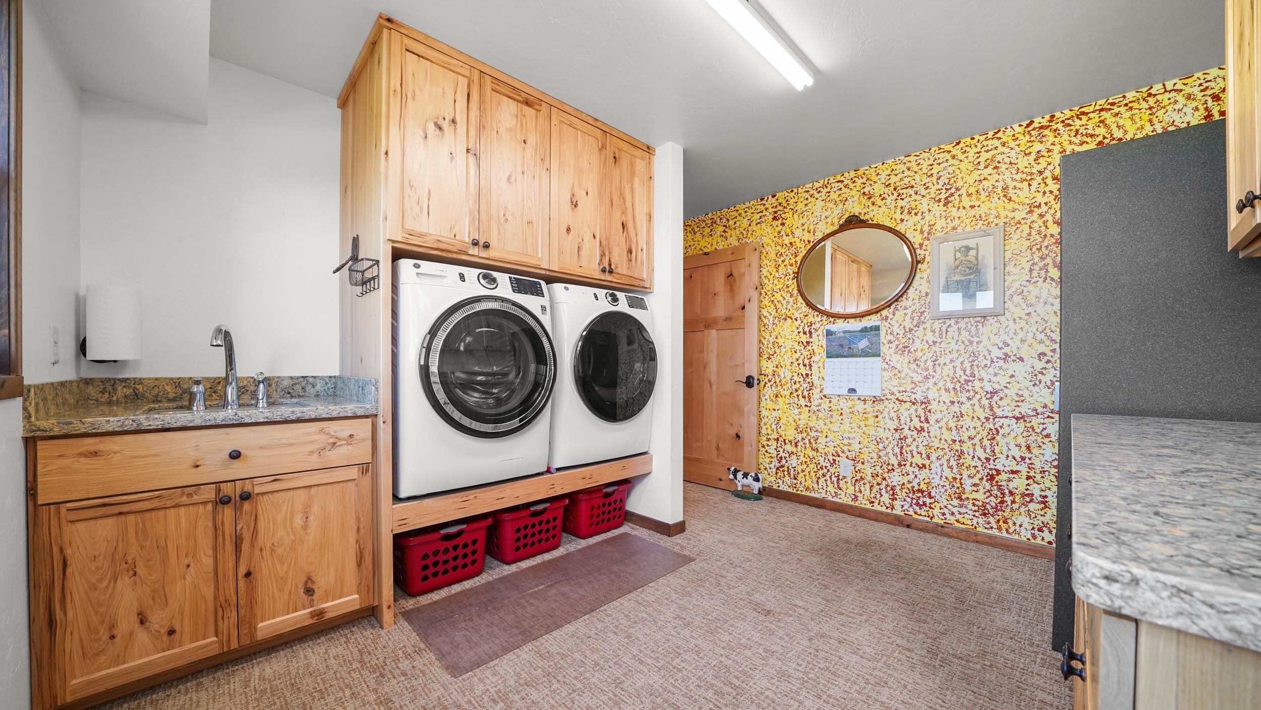 1029 25 Road Grand Junction, CO 81505 - Photo 31 of 42 a utility room with dryer and washer