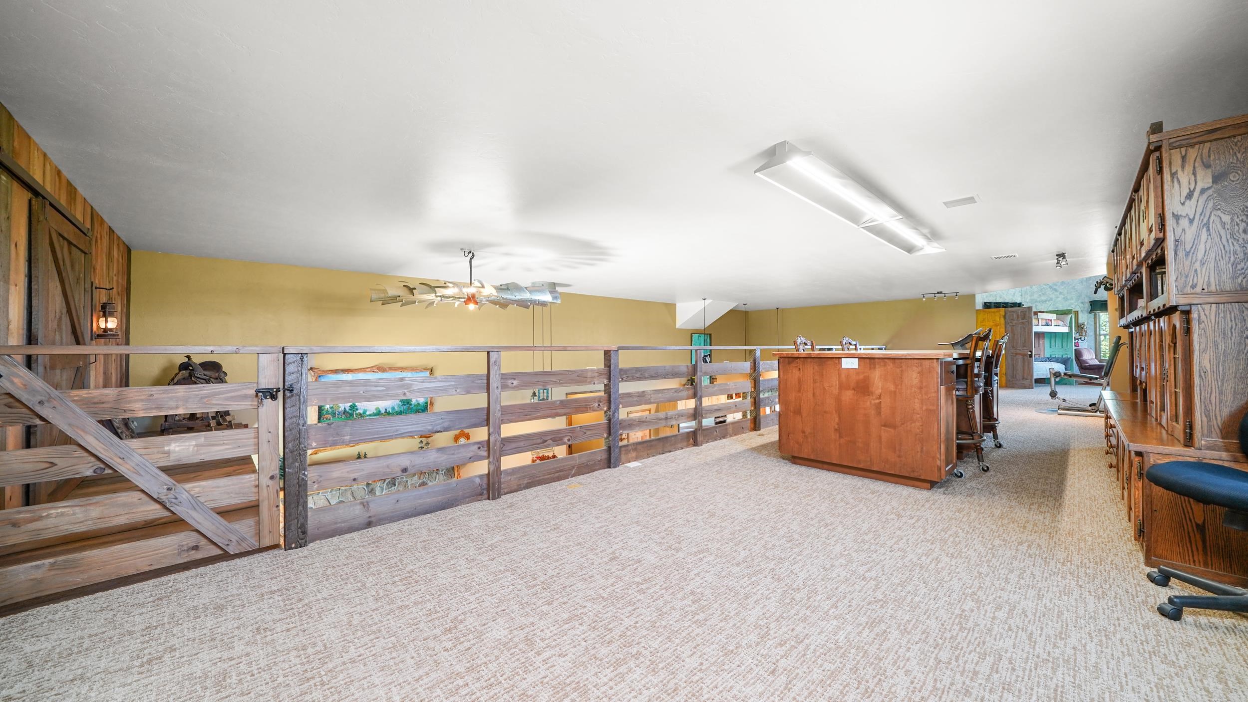 1029 25 Road Grand Junction, CO 81505 - Photo 34 of 41 a view of a livingroom with furniture and a flat screen tv