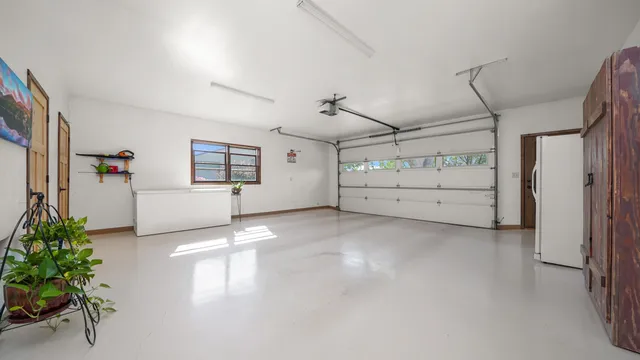 a view of a couches and dinning table in patio