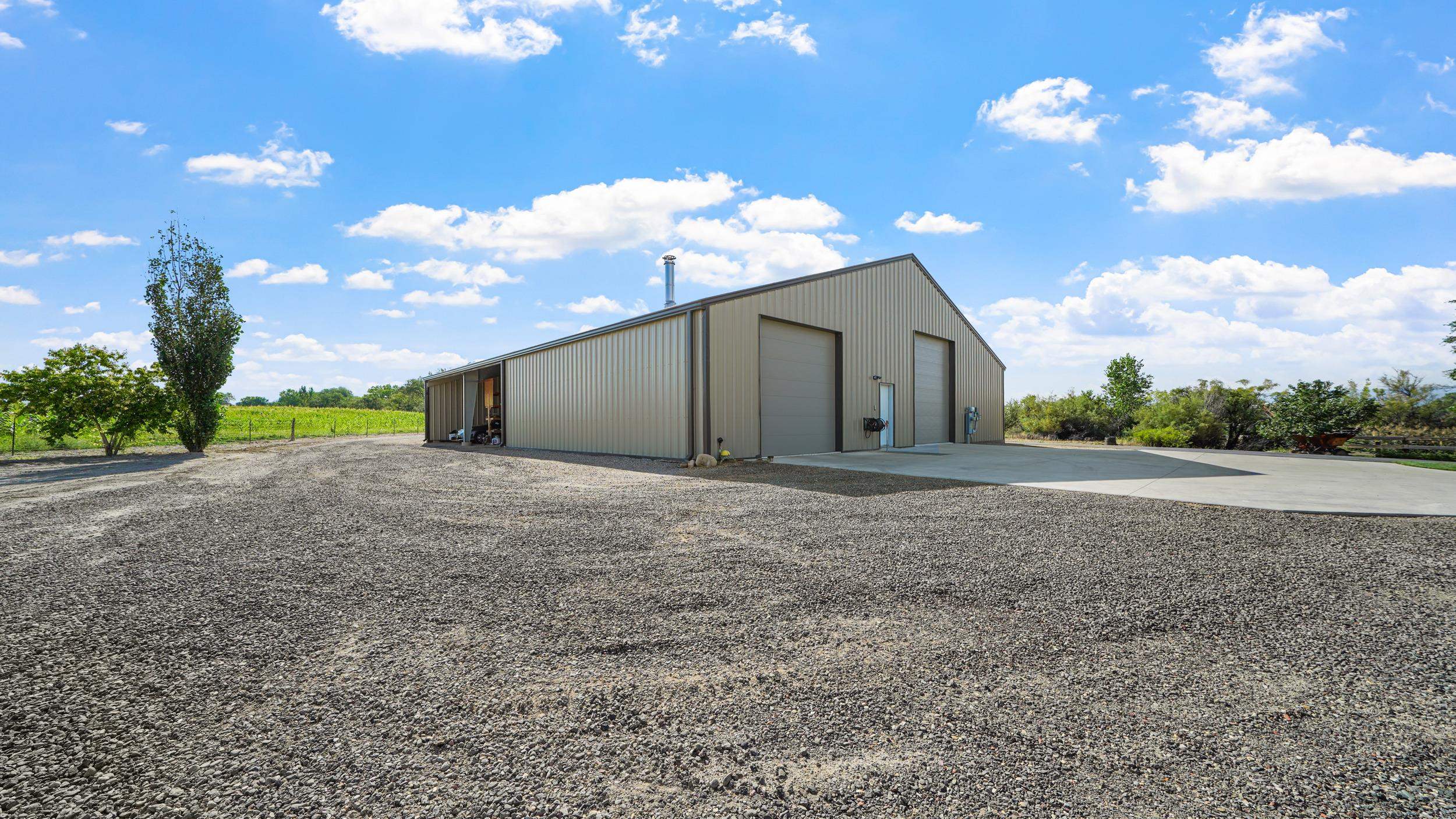 1029 25 Road Grand Junction, CO 81505 - Photo 41 of 42 a view of an house with backyard and garden