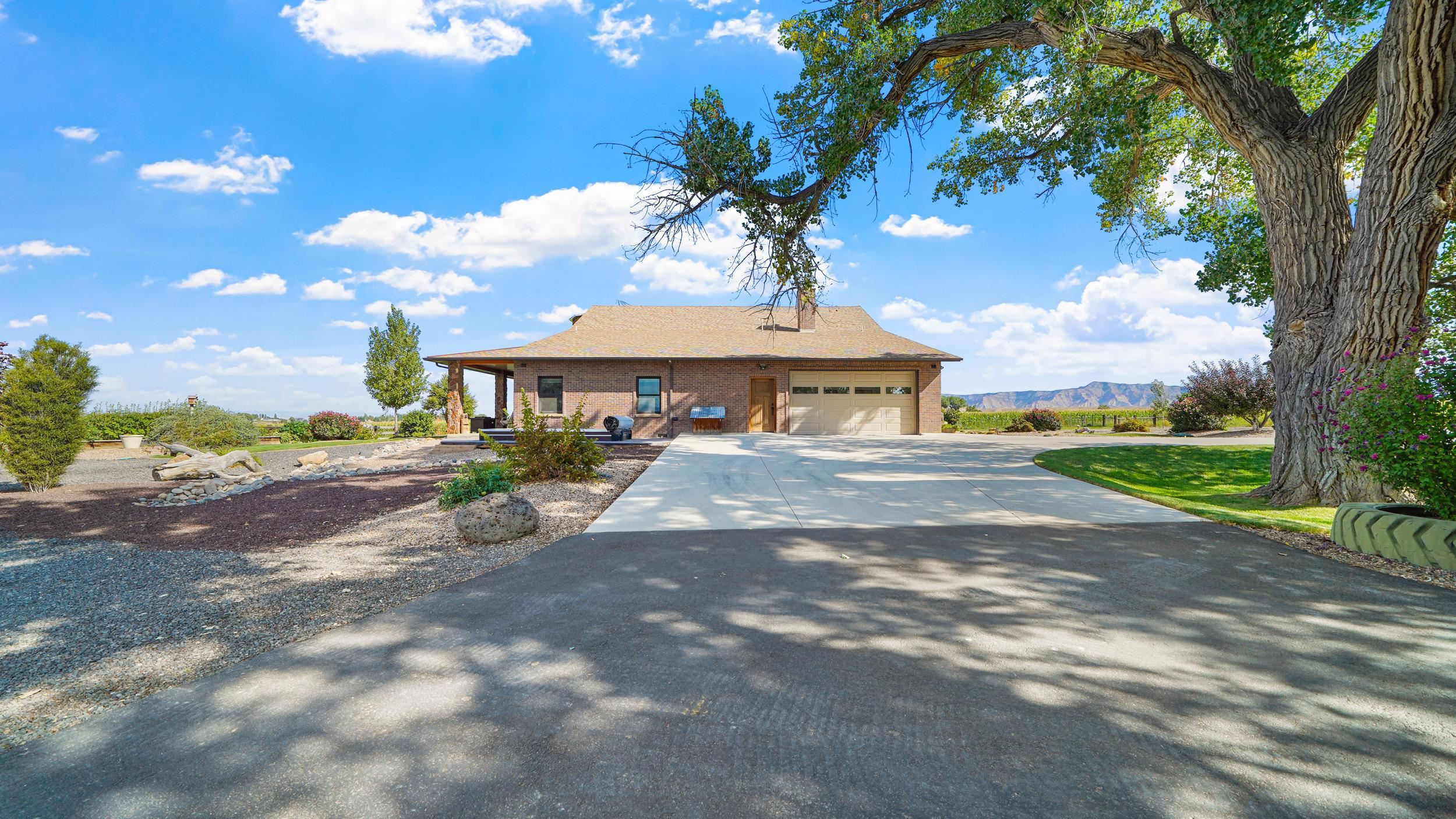 1029 25 Road Grand Junction, CO 81505 - Photo 9 of 41 a view of a house with a yard