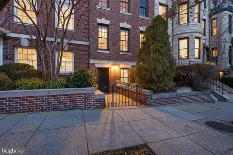 a view of a building with a bench