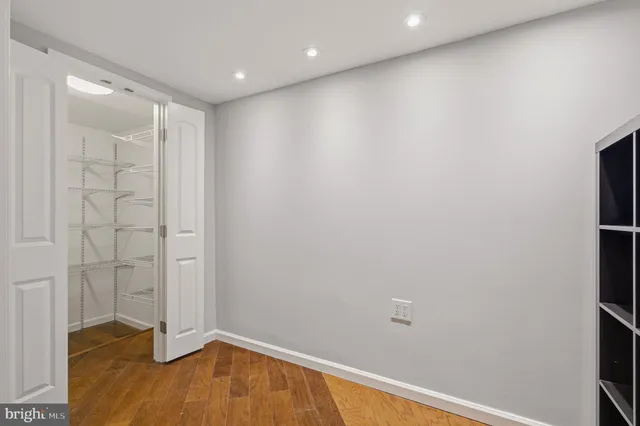a kitchen with a sink stove and refrigerator