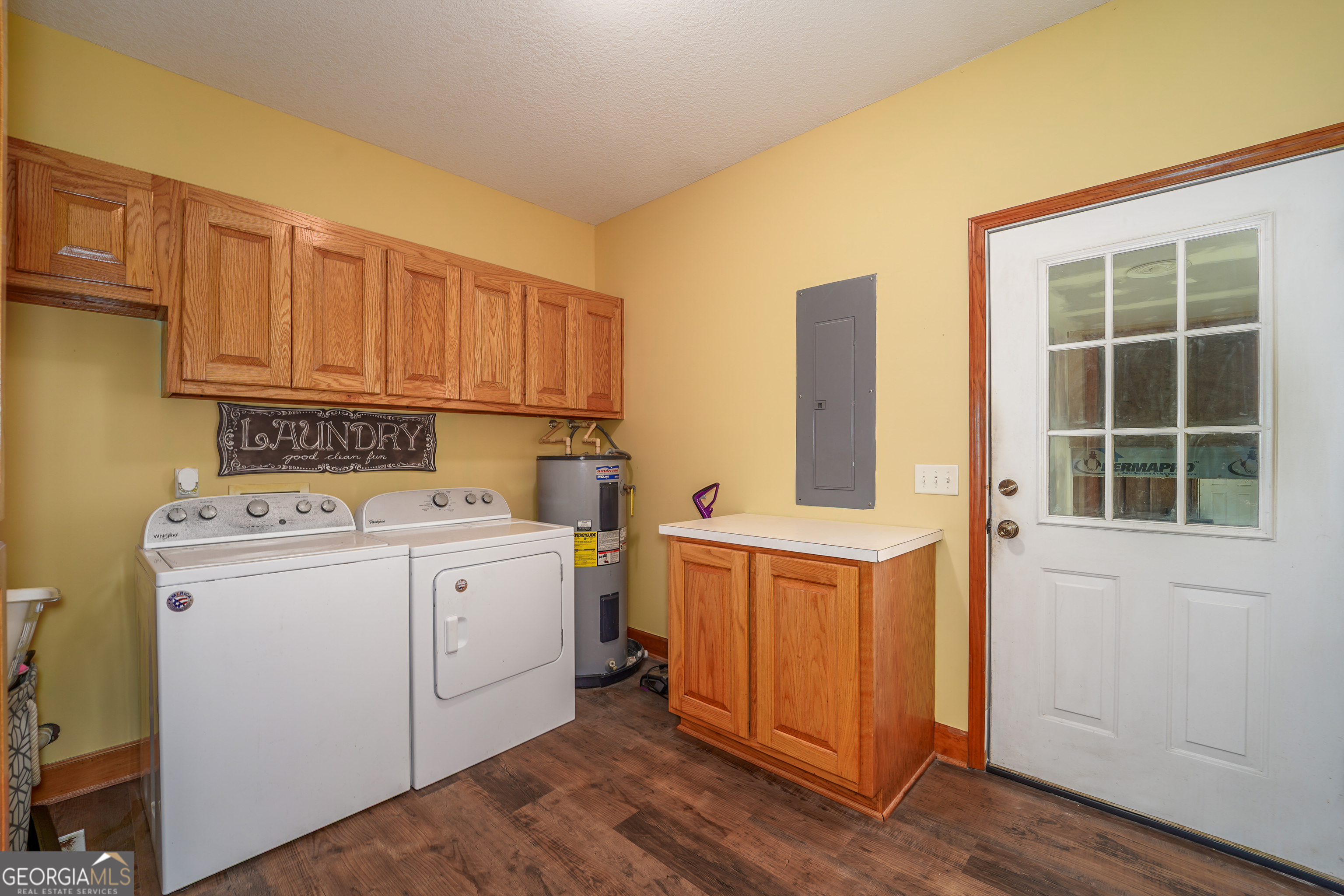 3300 Connor Lane Waycross, GA 31503 - Photo 39 of 42 a utility room with dryer and washer