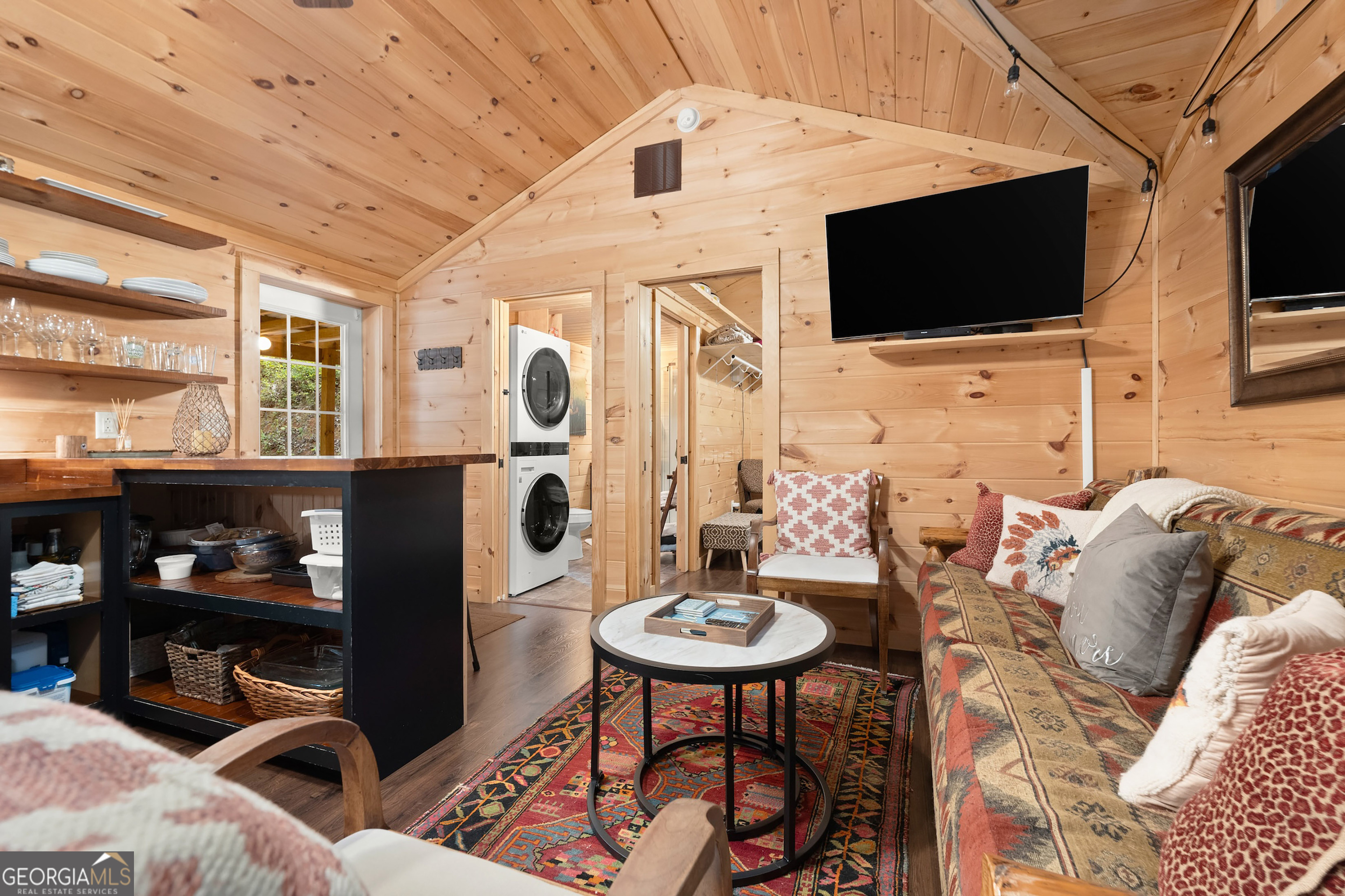 3103 Highway 197 Clarkesville, GA 30523 - Photo 12 of 30 a living room with furniture and a flat screen tv