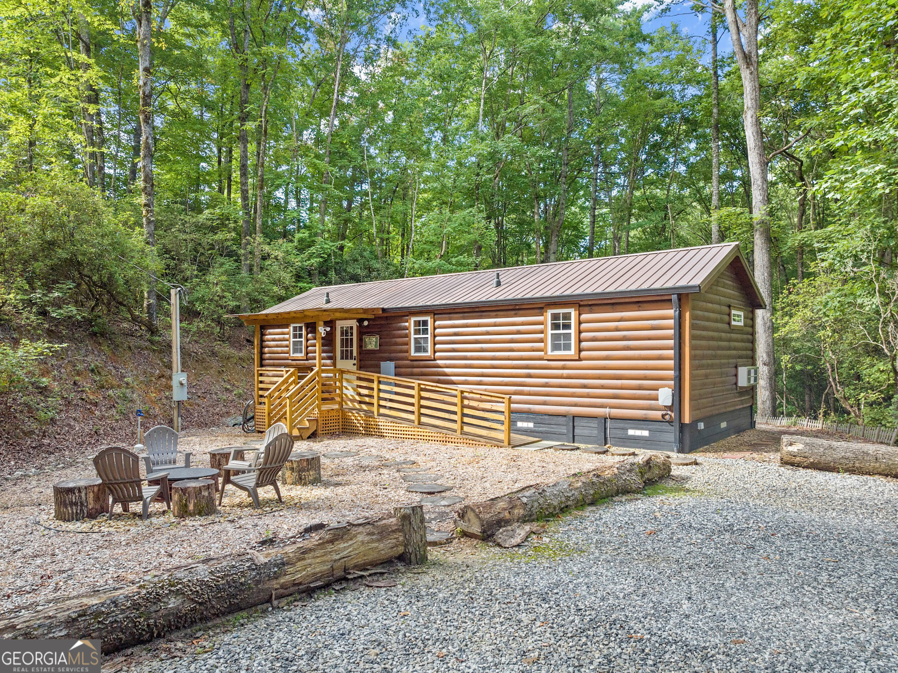 3103 Highway 197 Clarkesville, GA 30523 - Photo 2 of 30 a front view of a house with garden