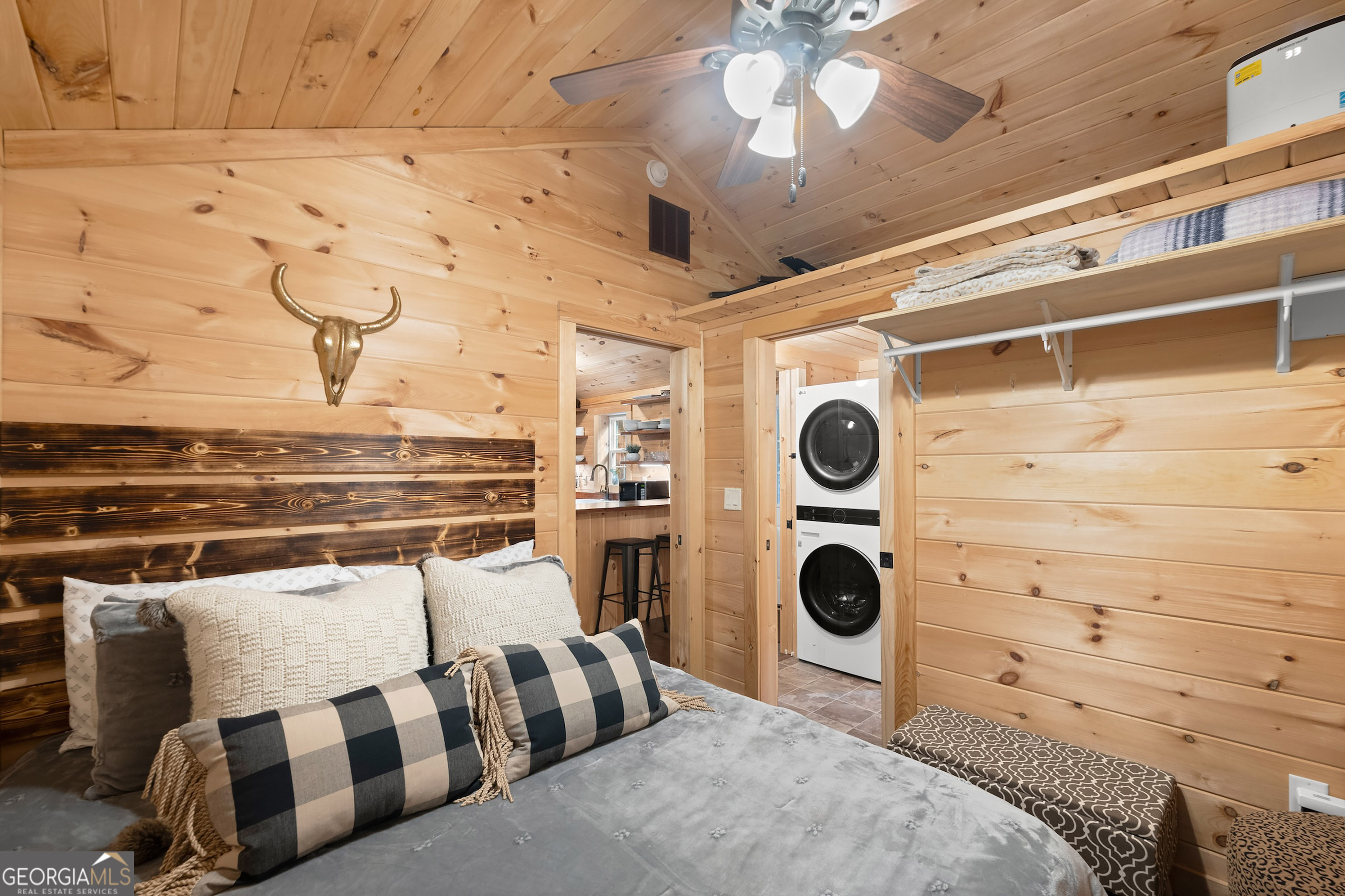 3103 Highway 197 Clarkesville, GA 30523 - Photo 21 of 30 a bedroom with a bed and cabinets