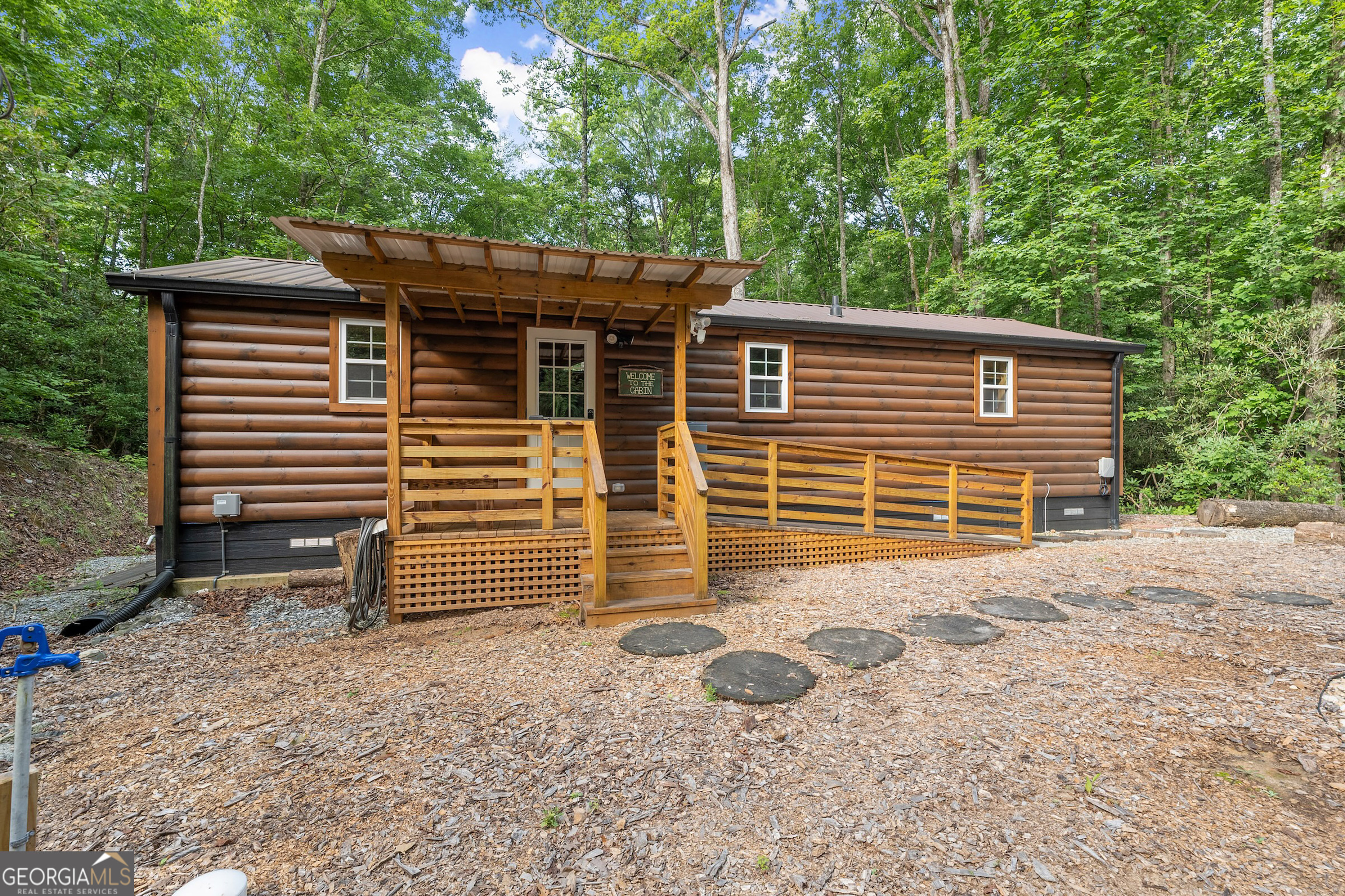 3103 Highway 197 Clarkesville, GA 30523 - Photo 30 of 30 a view of a house with a yard and large tree