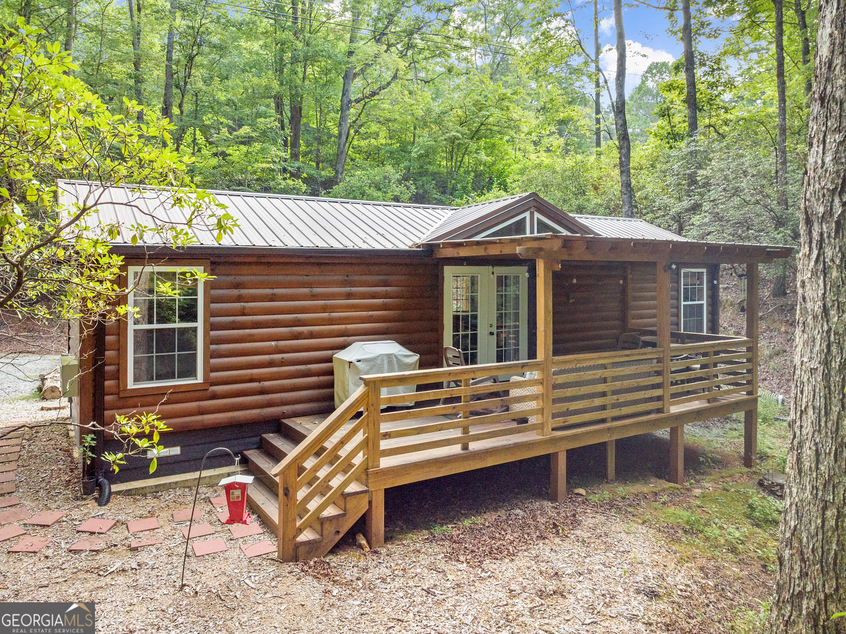 3103 Highway 197 Clarkesville, GA 30523 - Photo 6 of 30 a front view of a house with garden