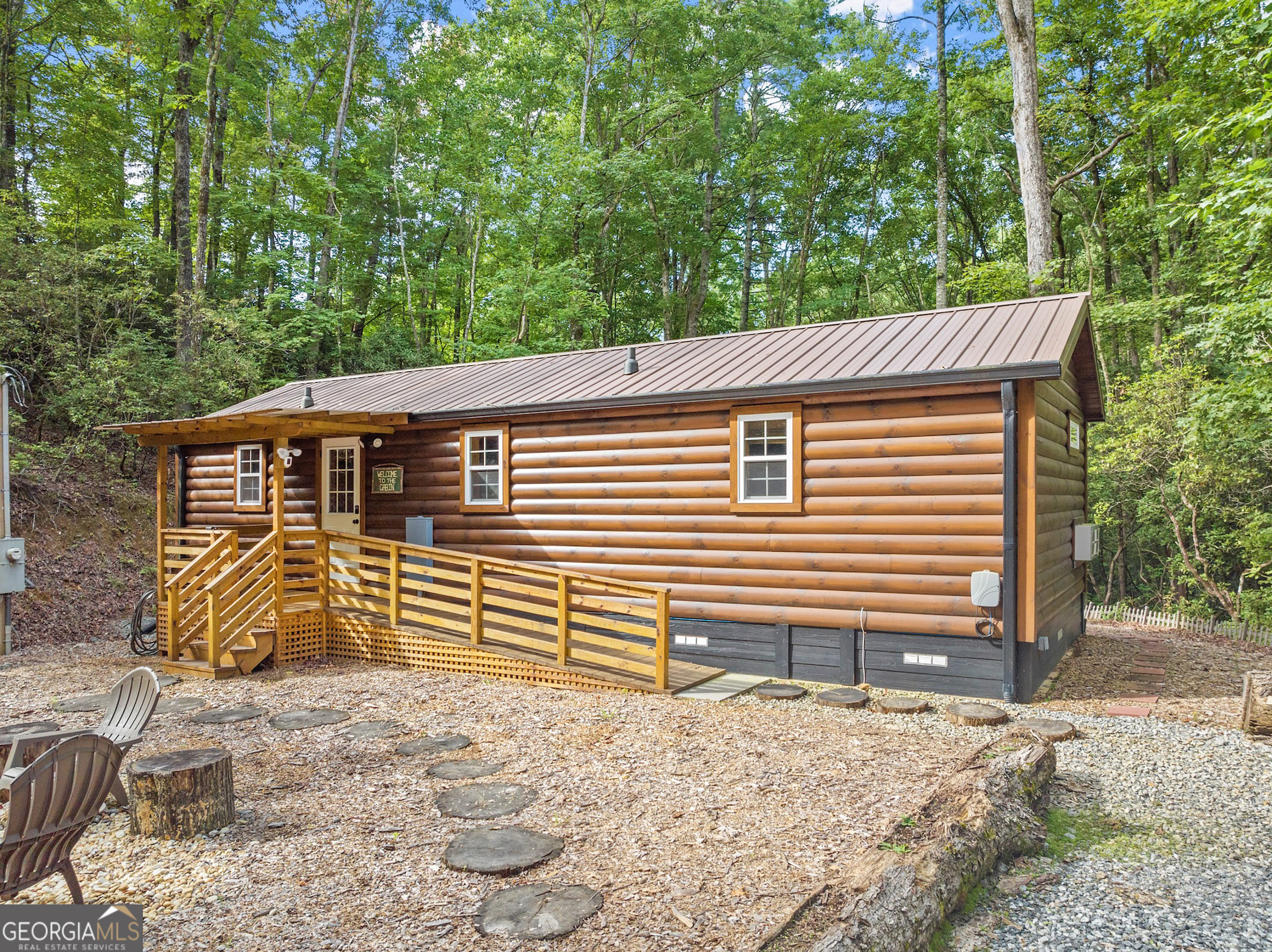3103 Highway 197 Clarkesville, GA 30523 - Photo 7 of 30 a front view of a house with a yard