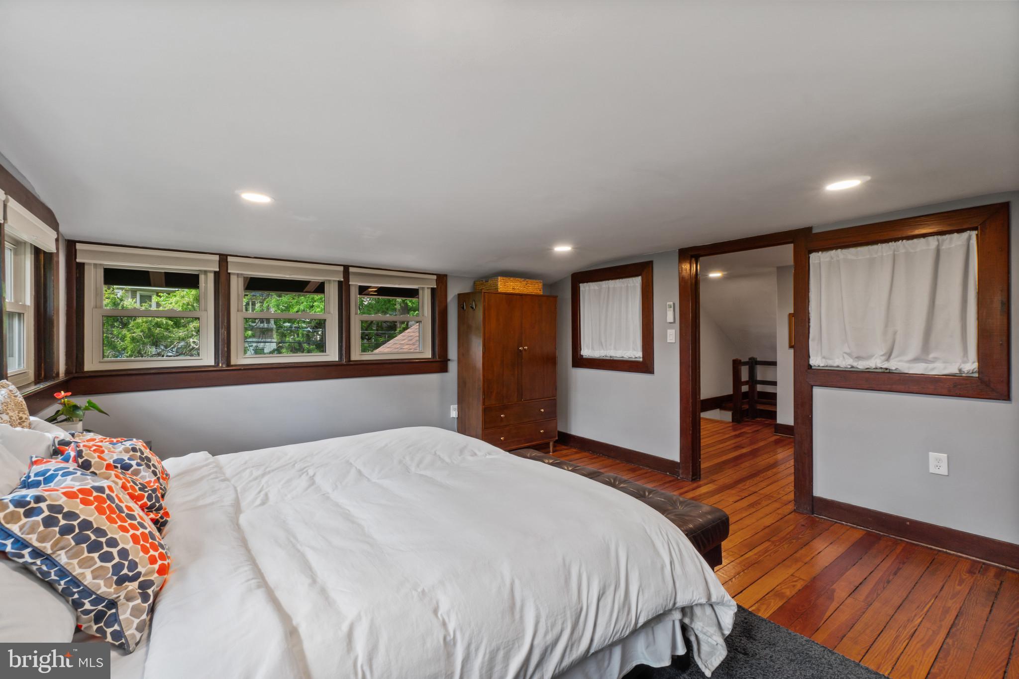 2900 Rueckert Avenue Baltimore, MD 21214 - Photo 28 of 40 a spacious bedroom with a large bed and a window
