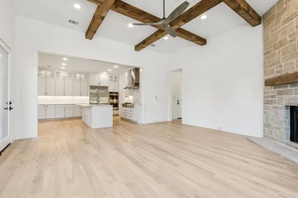 a view of a kitchen with a sink and a kitchen view