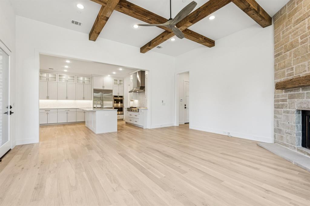 871 Beechwood Lane Fairview, TX 75069 - Photo 13 of 40 a view of a kitchen with a sink and a kitchen view