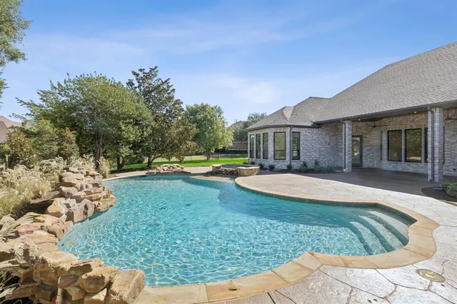 a view of outdoor space yard and swimming pool