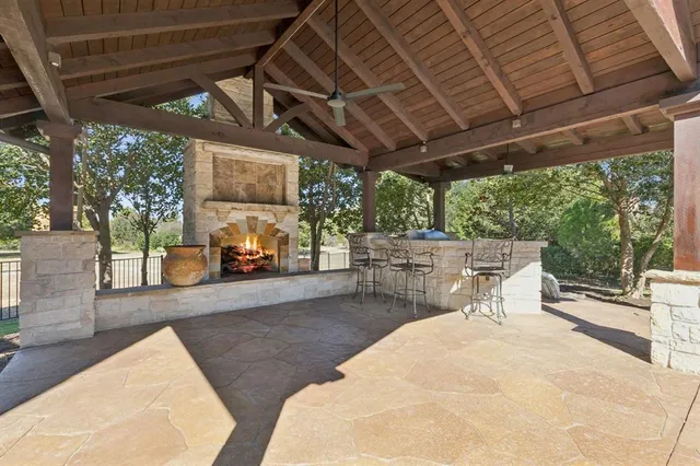 a view of a backyard with sitting area