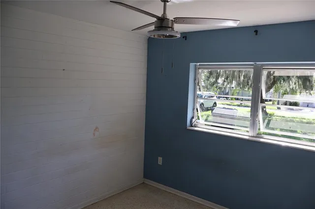 a view of empty room with a window